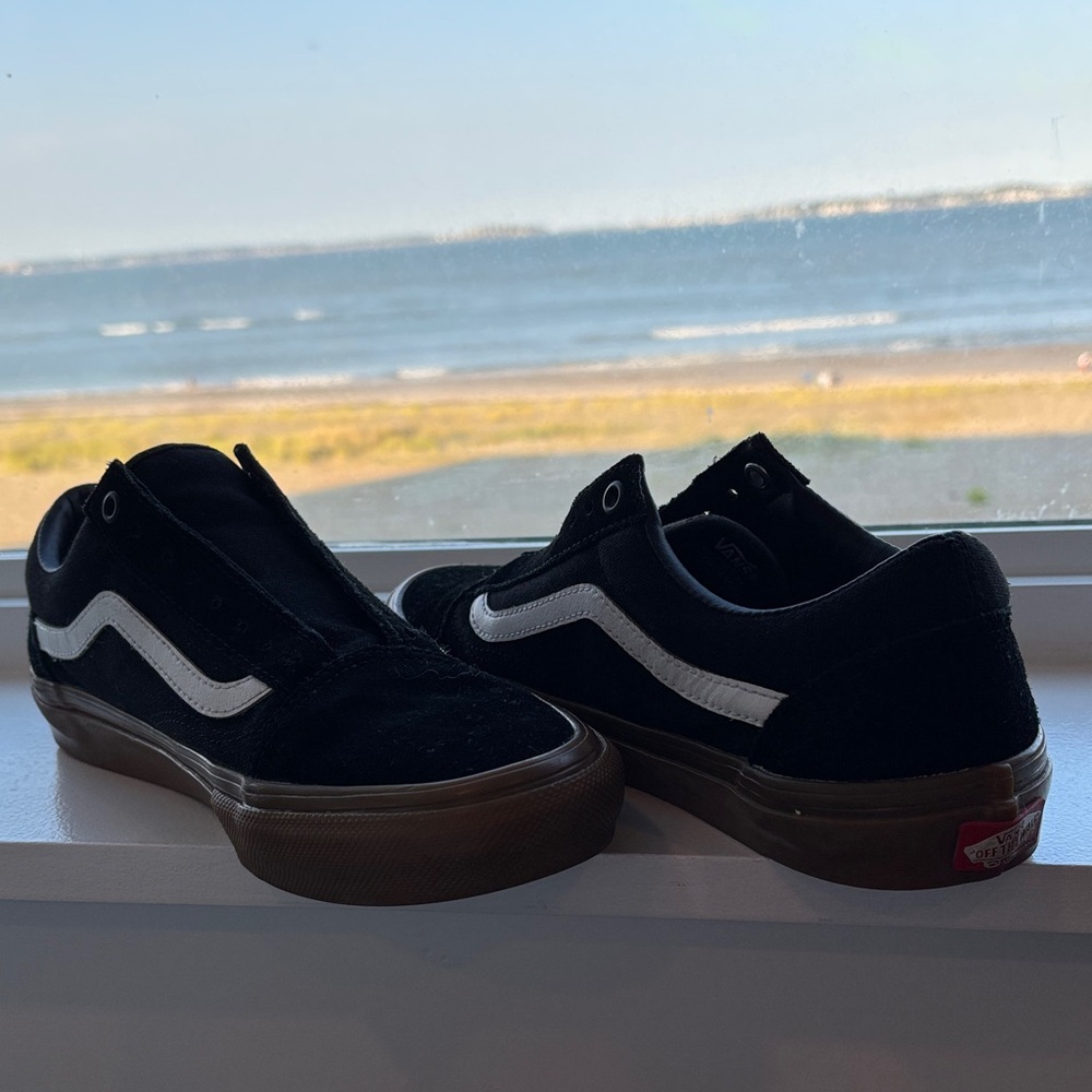 Vans Men's Black and White Slip-On Sneakers